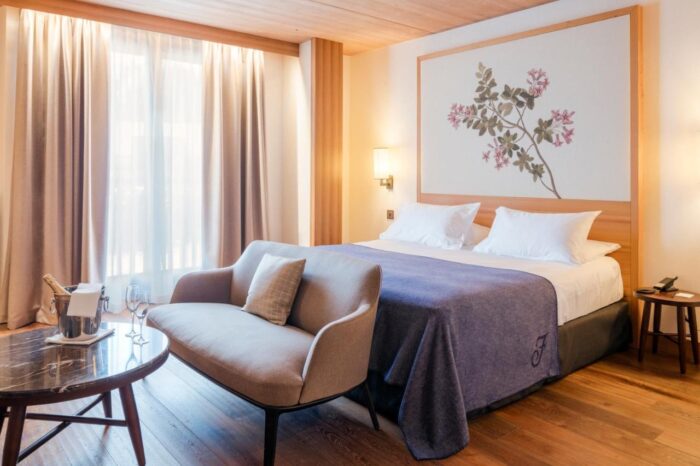 Faloria Mountain Spa Resort - Hotel em Cortina d'Ampezzo para curtir neve no inverno - imagem do quarto 