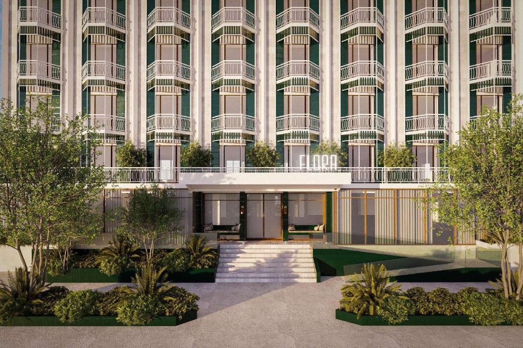 Grand Hotel Flora em Sorrento: hotel histórico reabre renovado em abril de 2026 5 Grand Hotel Flora em Sorrento: a fachada com escadaria e plantas nos arredores