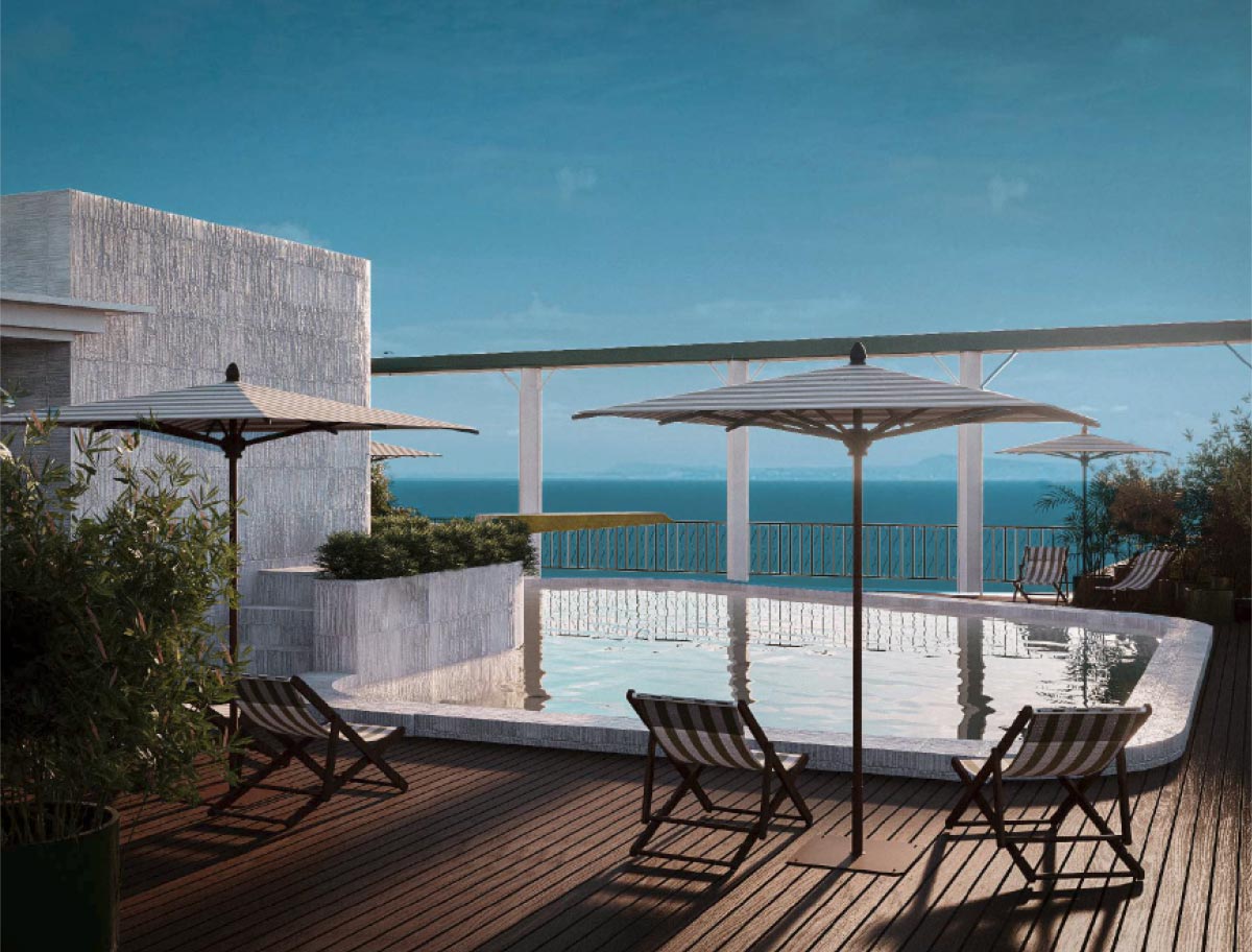 Grand Hotel Flora em Sorrento: hotel histórico reabre renovado em abril de 2026 3 Rooftop do Grand Hotel Flora em Sorrento com piscina, espreguiçadeiras listradas, sombrinhas e vista panorâmica para o Golfo de Nápoles