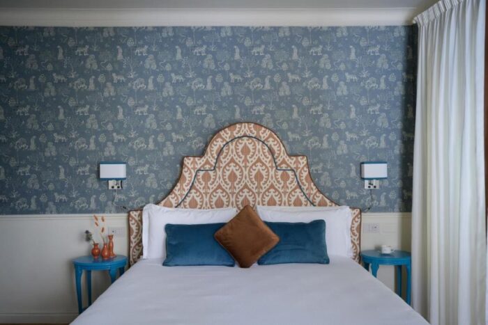 Hotéis em Florença, onde se hospedar 24 Quarto do Mabelle Centro com papel de parede azul e cabeceira estampada, em Florença