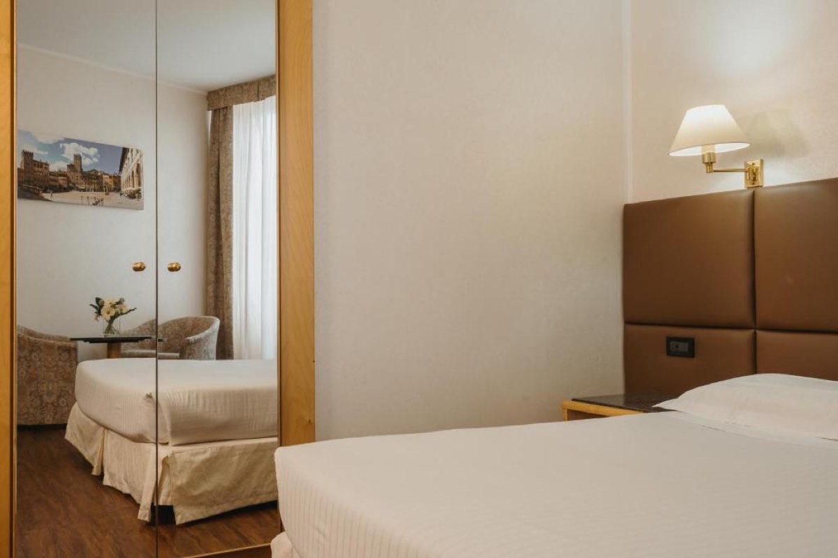 Hotéis em Arezzo, seleção com o melhor custo-benefício para sua viagem pela Toscana 29 Quarto do Hotel Minerva, em Arezzo